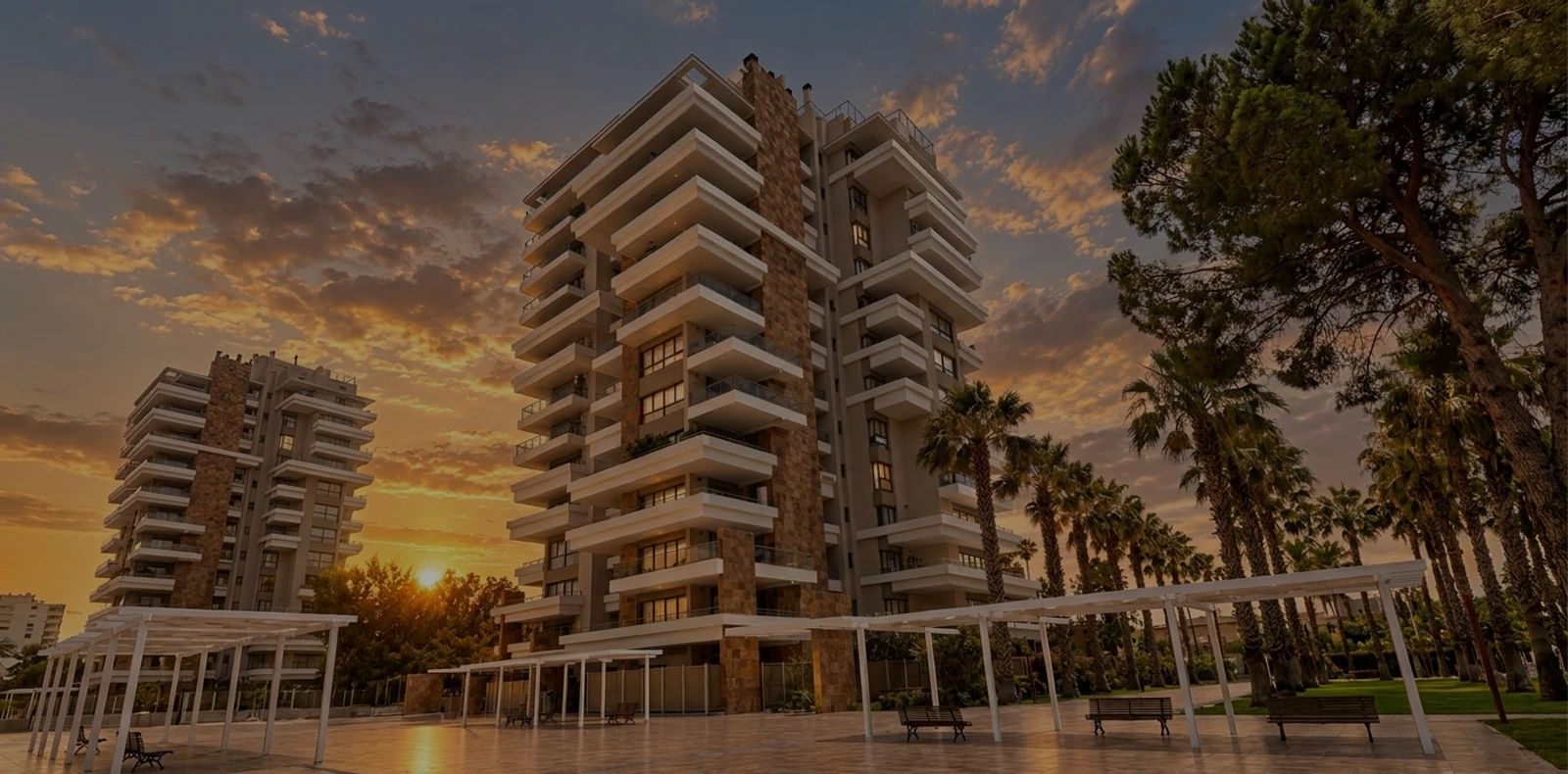 Torres residenciales de Villa Palmares al atardecer